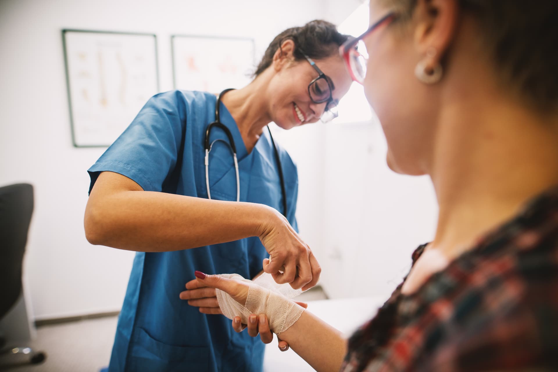 Mobile wound care clinician treating patient — Medipyxis EMR built for the field